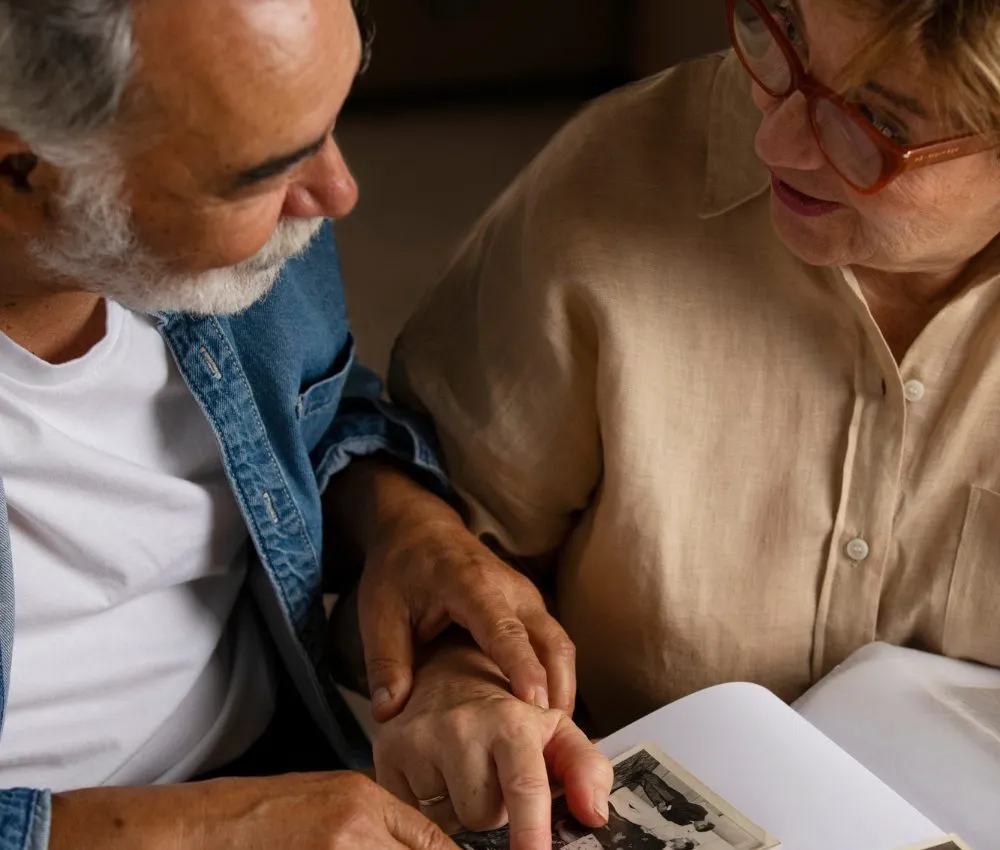 people looking picture album